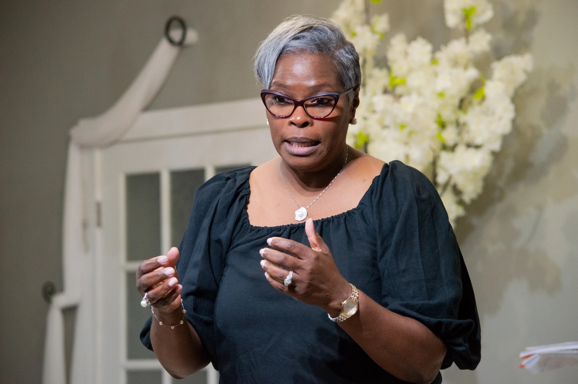 Sharron Debnam speaking with expressive hands